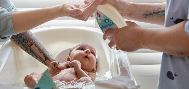 bathing newborn baby at home